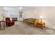 Bright living room has a fireplace, ceiling fan and carpeted floor at 124 Courtney Ln, Matthews, NC 28105