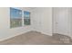 Cozy bedroom featuring natural light and neutral carpet at 129 Canada Dr # 85, Statesville, NC 28166