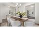 Cozy dining room with stylish chandelier, wooden table, and seating for six, perfect for entertaining at 129 Canada Dr # 85, Statesville, NC 28166