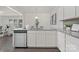 Modern kitchen with stainless steel appliances, white cabinetry, granite countertops, and dishwasher at 129 Canada Dr # 85, Statesville, NC 28166