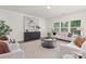 Inviting living room with large windows, elegant furnishings, and modern decor creating a comfortable space at 129 Canada Dr # 85, Statesville, NC 28166