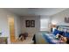 This is an inviting bedroom with wood accents, playful decor, and a window with natural light at 133 Way Cross Ln, Troutman, NC 28166