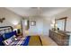 This is a neat bedroom with a coordinated bedside table and dresser, and doorways to other rooms at 133 Way Cross Ln, Troutman, NC 28166