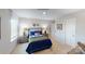 Cozy bedroom with baseball themed decor, including a baseball glove and wood finished night stands at 133 Way Cross Ln, Troutman, NC 28166