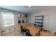 This is a stylish dining room showcasing design options and a large window for natural light at 133 Way Cross Ln, Troutman, NC 28166
