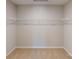 Empty walk-in closet with carpet and wired shelving ready for your personal touch at 133 Way Cross Ln, Troutman, NC 28166