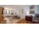 Inviting dining area with stylish furniture, elegant decor, and hardwood floors at 136 Mary Locke Way, Statesville, NC 28677