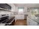Elegant kitchen boasting granite countertops, stainless steel appliances, and natural light at 136 Mary Locke Way, Statesville, NC 28677