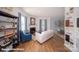 Spacious living area with a fireplace, stylish shelving, and an open view into the dining space at 136 Mary Locke Way, Statesville, NC 28677