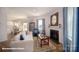 Comfortable living room with a fireplace, stylish decor, and an adjacent dining area at 136 Mary Locke Way, Statesville, NC 28677