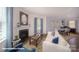 Open-concept living space with a fireplace, comfortable seating, and a view into the dining area at 136 Mary Locke Way, Statesville, NC 28677