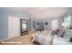Spacious bedroom with blue walls, large mirror, carpet, and two closets, offering lots of room at 136 Mary Locke Way, Statesville, NC 28677