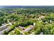 Attractive aerial view of a multi-Gathering residential community surrounded by mature trees at 1485 20Th Ne Ave, Hickory, NC 28601