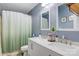 Bathroom with double sink vanity, decorative mirrors, and a shower with curtain at 1485 20Th Ne Ave, Hickory, NC 28601