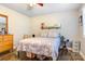 Bedroom with a wooden dresser, laminate floors, with a queen bed, and a ceiling fan at 1485 20Th Ne Ave, Hickory, NC 28601