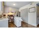 Updated kitchen featuring gray cabinets, stainless steel appliances, and a practical rolling island for flexible workspace at 1485 20Th Ne Ave, Hickory, NC 28601