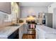 Updated kitchen featuring gray cabinets, stainless steel appliances, and sleek white countertops at 1485 20Th Ne Ave, Hickory, NC 28601