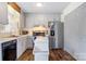 Bright kitchen with gray cabinets, stainless steel appliances, and a functional rolling island at 1485 20Th Ne Ave, Hickory, NC 28601
