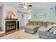 Comfortable living room features fireplace, modern furnishings, and a large area rug at 1485 20Th Ne Ave, Hickory, NC 28601