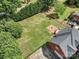 Aerial view of a home showcasing a large, grassy backyard with a patio and fenced perimeter at 1498 Farrow Dr, Rock Hill, SC 29732