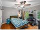 A cheerful bedroom boasts hardwood floors and plenty of natural light at 1498 Farrow Dr, Rock Hill, SC 29732