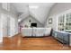 Bright bonus room with hardwood floors, large sectional, and playroom for  at 1498 Farrow Dr, Rock Hill, SC 29732