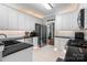 Contemporary kitchen featuring white cabinets, dark countertops, tile backsplash, and stainless steel appliances at 1498 Farrow Dr, Rock Hill, SC 29732