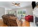 Inviting living room boasts hardwood floors, a fireplace, and a large window with natural light at 1498 Farrow Dr, Rock Hill, SC 29732