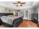 Large primary bedroom with trey ceilings, hardwood floors, and a private bath area at 1498 Farrow Dr, Rock Hill, SC 29732