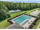 Community pool with ample seating, well maintained landscaping, and nearby tennis courts at 1498 Farrow Dr, Rock Hill, SC 29732