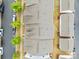 Aerial view showing a row of townhomes with parking and landscaping at 15021 Meacham Farm Dr, Huntersville, NC 28078
