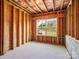 Unfinished basement room ready to be customized, with a large window providing natural light at 15429 Topanga Dr, Charlotte, NC 28278