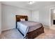 Comfortable bedroom with a queen-sized bed and drawer storage at 15429 Topanga Dr, Charlotte, NC 28278