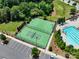 Aerial view of community amenities including swimming pool, tennis court, and basketball court at 15429 Topanga Dr, Charlotte, NC 28278