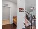 Inviting entryway featuring a staircase with carpeted steps and a coat rack for convenience at 15429 Topanga Dr, Charlotte, NC 28278