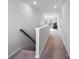 Upstairs hallway with carpet flooring leading to other rooms at 15429 Topanga Dr, Charlotte, NC 28278