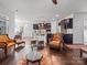 Open-concept living space with hardwood floors, transitioning seamlessly to the kitchen and dining areas at 15429 Topanga Dr, Charlotte, NC 28278