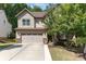 Charming craftsman style home with a two-car garage, neutral color palette, and lush landscaping in a desirable neighborhood at 15536 Oleander Dr # L228, Charlotte, NC 28278