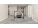 Upstairs hallway features plush gray carpets and open stairway leading to the lower level at 15536 Oleander Dr # L228, Charlotte, NC 28278