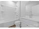 Well-lit bathroom featuring tub with shower and vanity sink at 1747 Slippery Rock Ln, Monroe, NC 28112