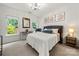 Cozy bedroom with natural light, neutral decor, a comfortable bed and carpet flooring at 19507 Dufour Ct, Cornelius, NC 28031