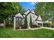Beautiful two-story home with a well-manicured lawn and attractive landscaping at 19507 Dufour Ct, Cornelius, NC 28031