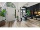 Elegant foyer with hardwood floors and views into music room at 19507 Dufour Ct, Cornelius, NC 28031