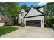 A beautiful two-story home featuring a spacious garage and well-maintained lawn at 19507 Dufour Ct, Cornelius, NC 28031