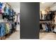 Spacious walk-in closet with ample storage, organized shelving, and rods for hanging clothes at 19507 Dufour Ct, Cornelius, NC 28031