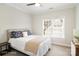 Relaxing bedroom with ceiling fan, plush carpet and large window providing an abundance of natural light at 20107 N Cove Rd, Cornelius, NC 28031