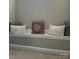 Inviting bedroom nook with decorative pillows and neutral wall color at 20107 N Cove Rd, Cornelius, NC 28031