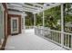 Inviting deck with ample space, offering a great view of the landscaped backyard and surrounding greenery at 20107 N Cove Rd, Cornelius, NC 28031