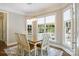 Charming dining area with large windows, letting in natural light at 20107 N Cove Rd, Cornelius, NC 28031