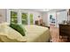 Cozy bedroom features bright light from the windows and closet space at 204 S Elm St, Cherryville, NC 28021